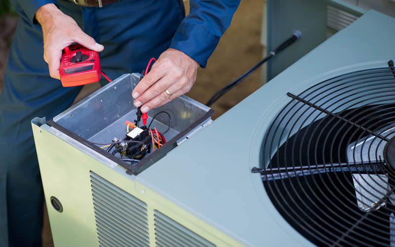 DIY AC Maintenance vs. Professional Servicing